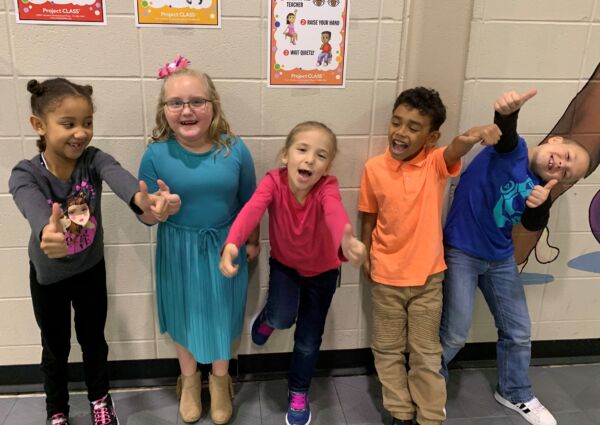 1st graders with thumbs up for Project CLASS