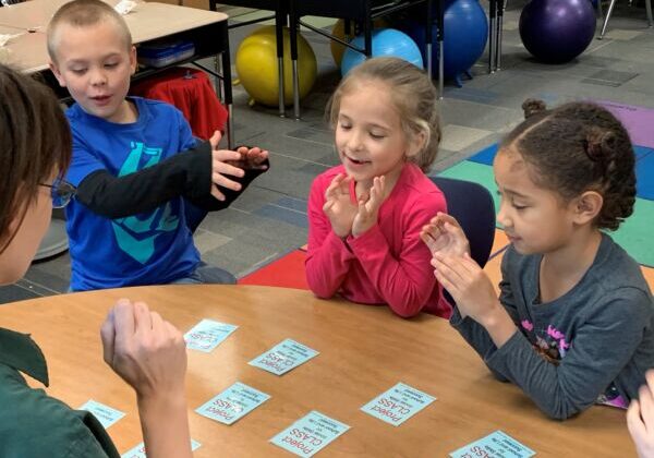 3 students engaged in a Project CLASS activity
